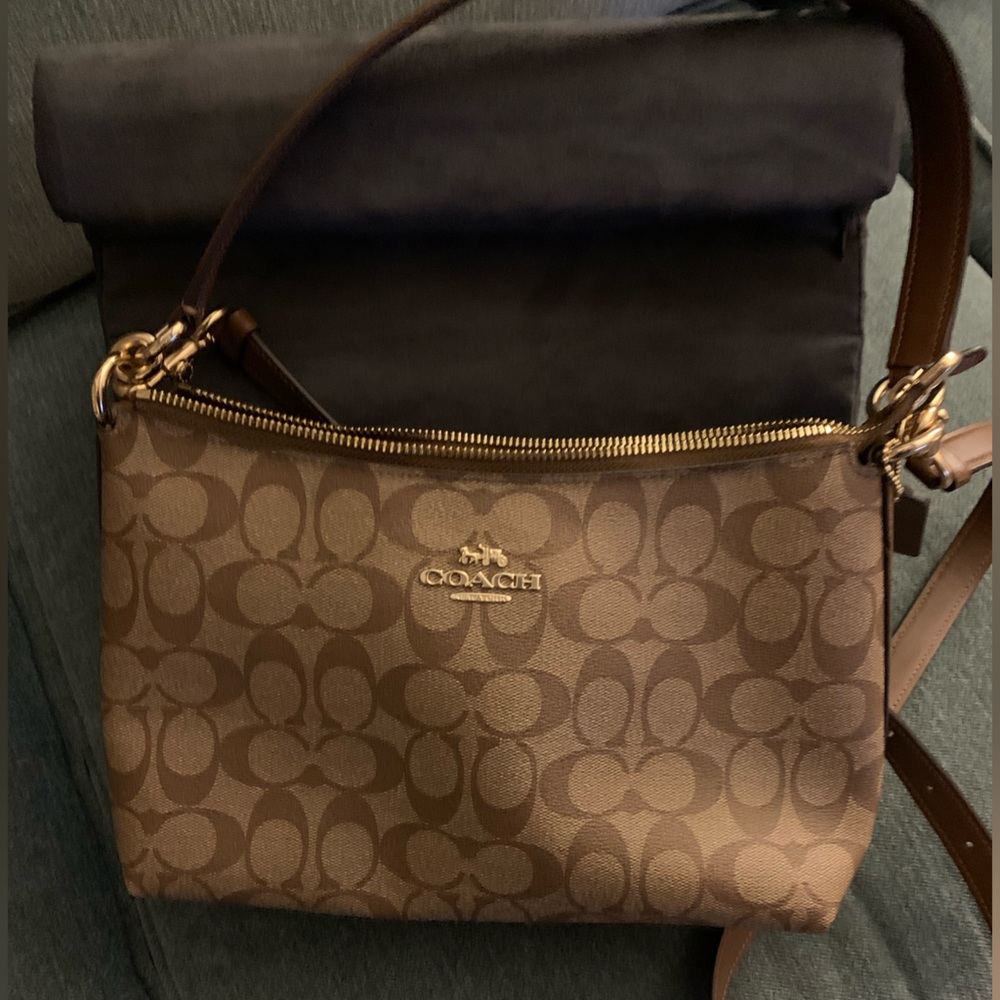 Signature coach shoulder cross body bag